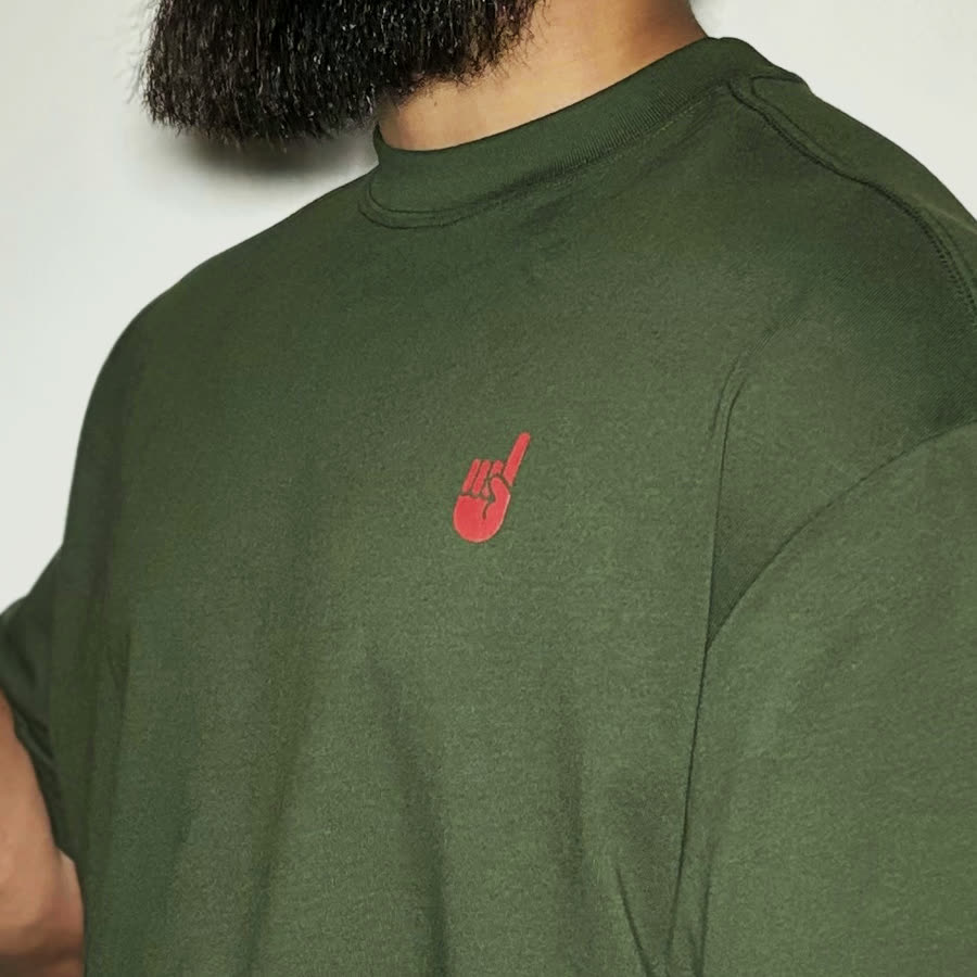 Red finger logo on the chest